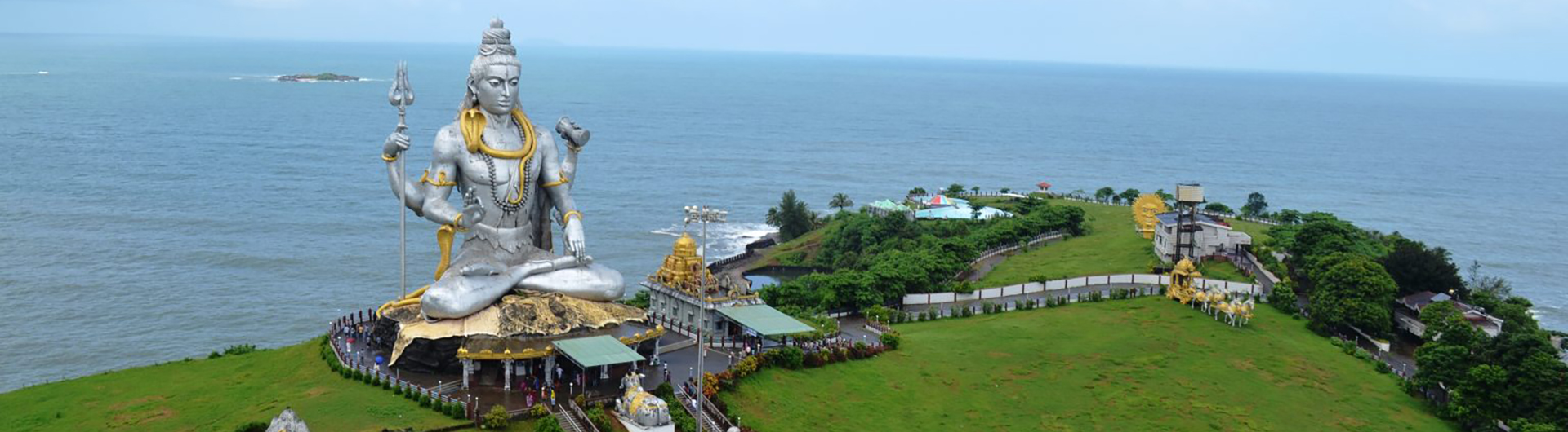 Statue of Lord Shiva. Located in Murdeshwar, Karnataka, India. A famous pilgrimage spot in Karnataka. This place is surrounded by the Arabian sea on three sides.