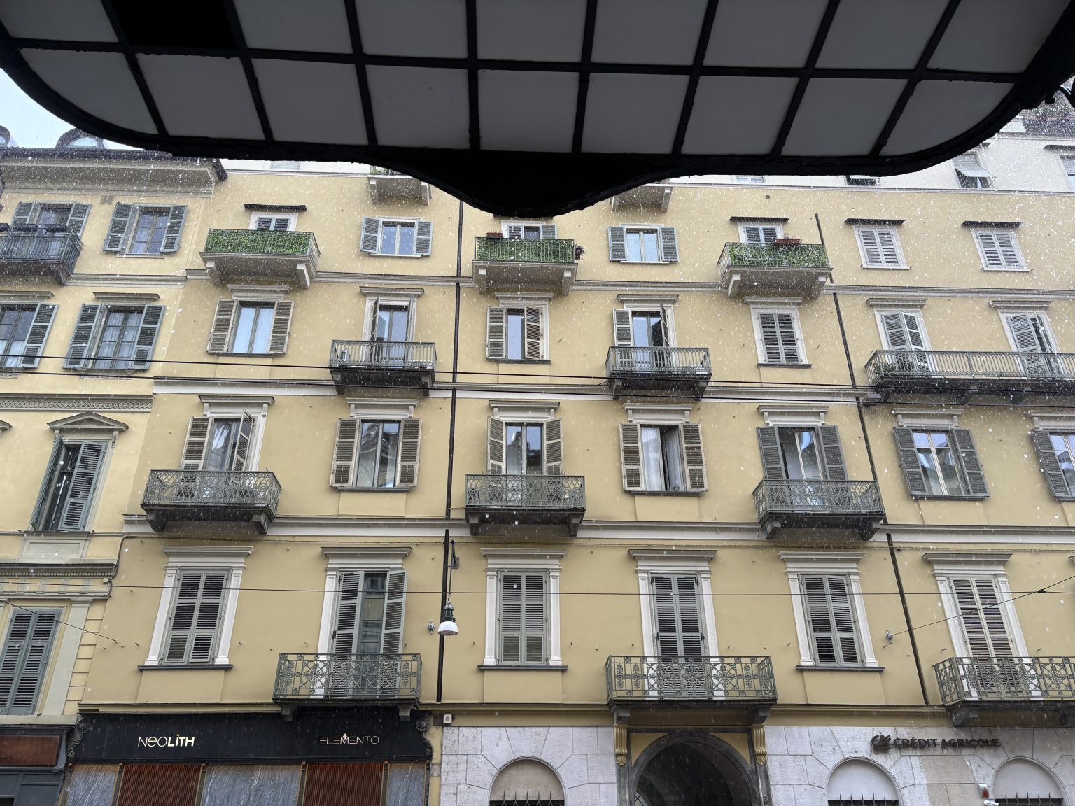 Apartment windows in Torino Italy.